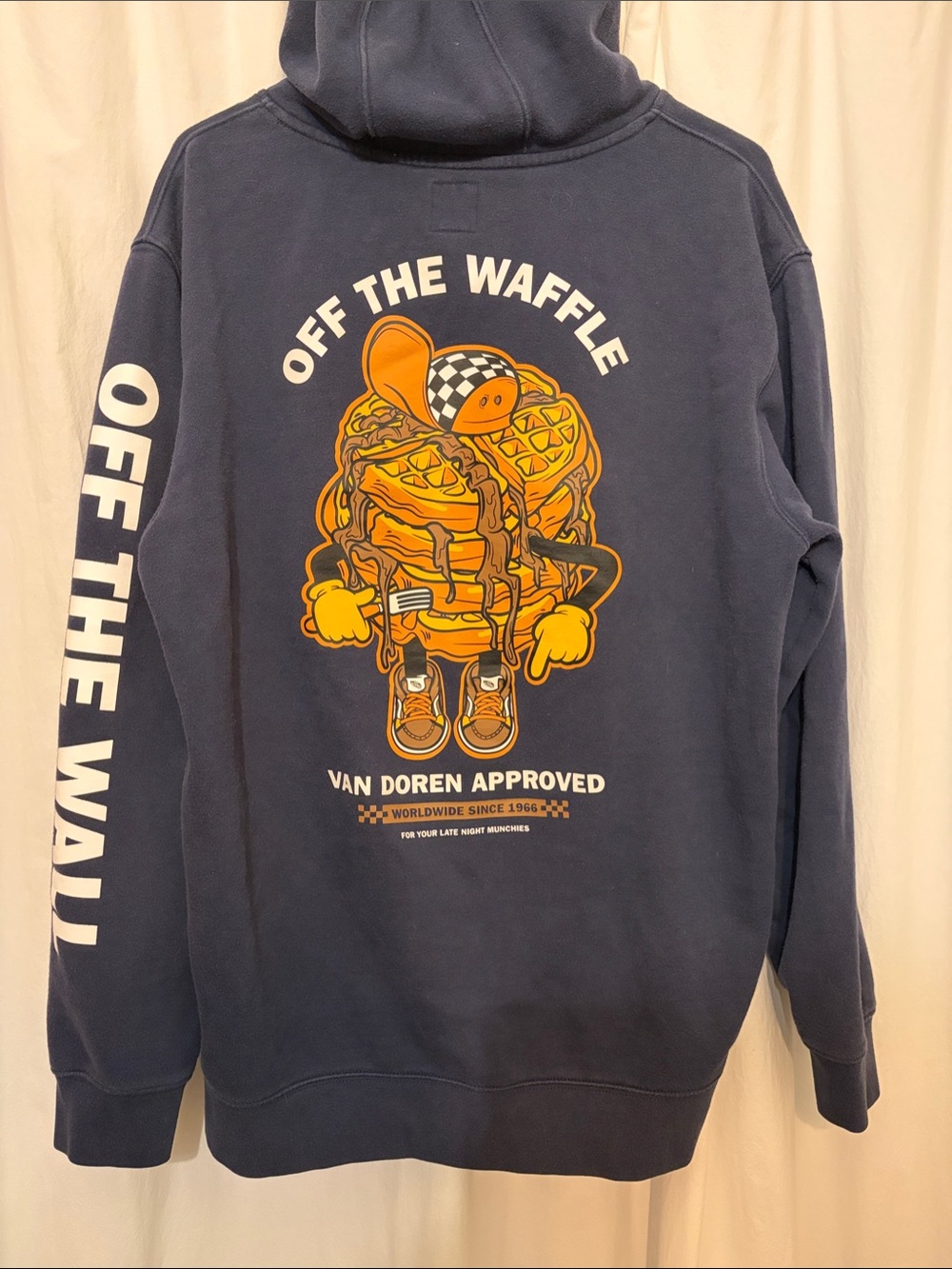 Vans Navy Hoodie with Orange Logo and White Sleeve Text